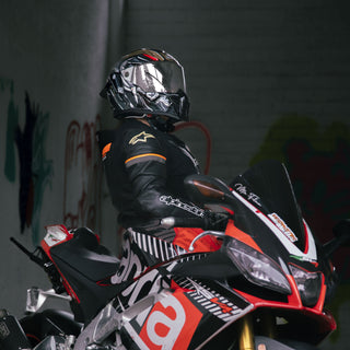rider-posing-with-hax-black-pearl-full-face-helmet-on-sport-motorcycle