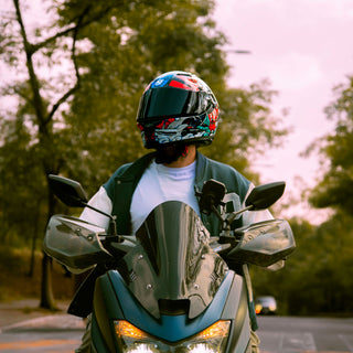 motorcycle-rider-wearing-hax-obsidian-samurai-full-face-helmet-on-the-road